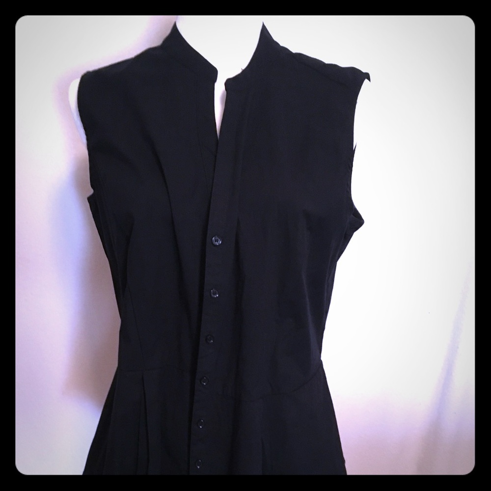 Sleeveless button down top